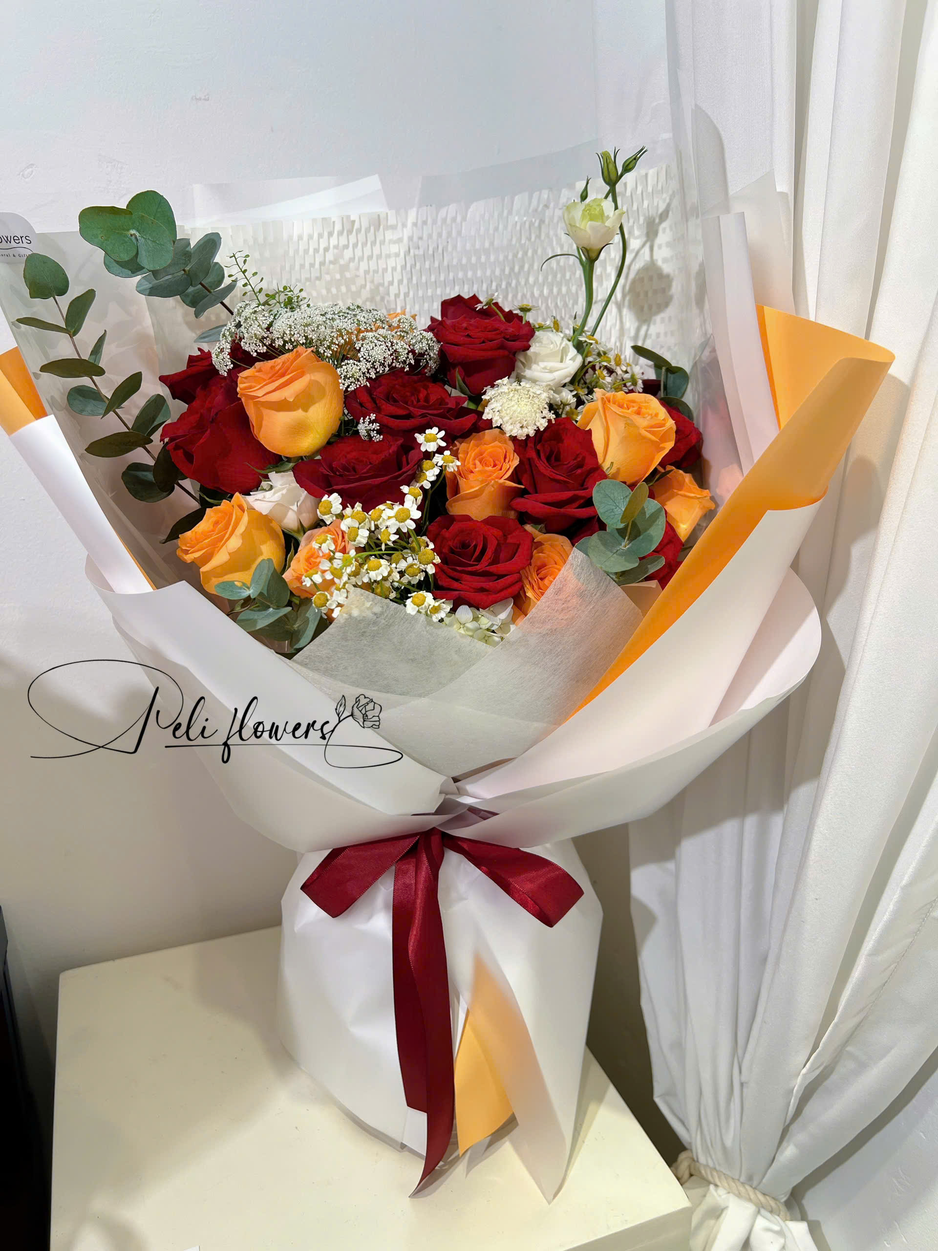 Bó hoa hồng Ecudo mix hồng cam